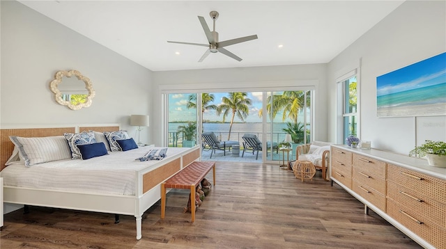 bedroom with access to exterior, ceiling fan, and dark hardwood / wood-style flooring