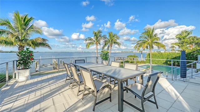 view of patio featuring a water view