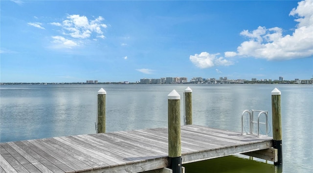 view of dock with a water view