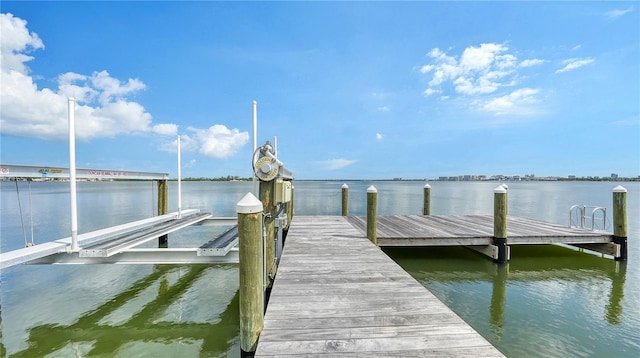 dock area with a water view