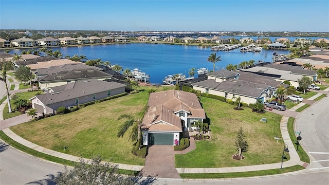 bird's eye view with a water view