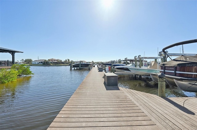 view of dock with a water view