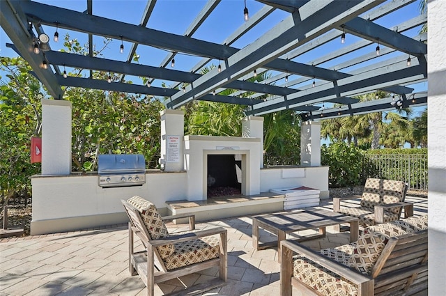 view of patio featuring a pergola, grilling area, an outdoor living space with a fireplace, and exterior kitchen