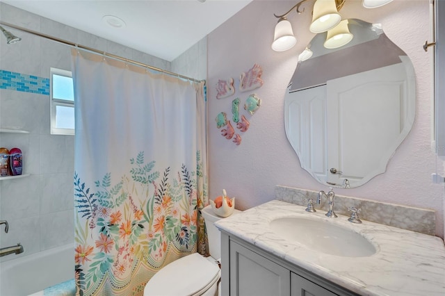 full bathroom with vanity, toilet, and shower / tub combo