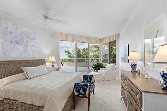 carpeted bedroom featuring ceiling fan and access to outside