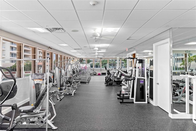 gym with a drop ceiling