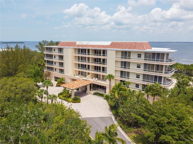 view of building exterior featuring a water view