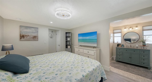 bedroom featuring light hardwood / wood-style floors