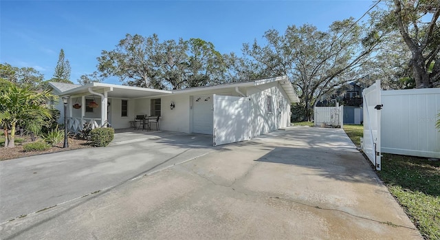 view of front of home with a carport