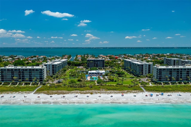 drone / aerial view with a view of the beach and a water view