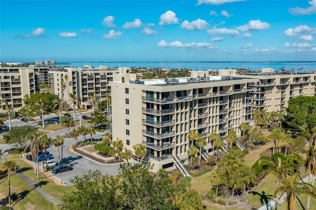 view of building exterior with a water view