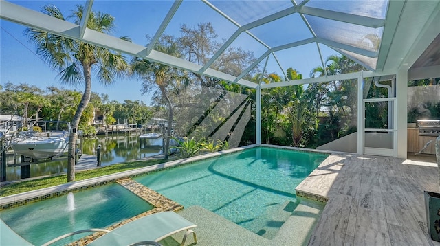 view of pool with a boat dock, a water view, grilling area, and a lanai