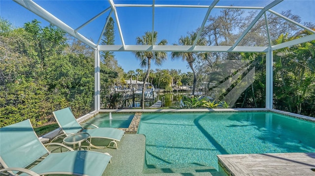 view of pool with a water view and a lanai