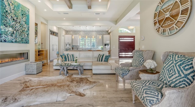 living room featuring light hardwood / wood-style flooring and beamed ceiling