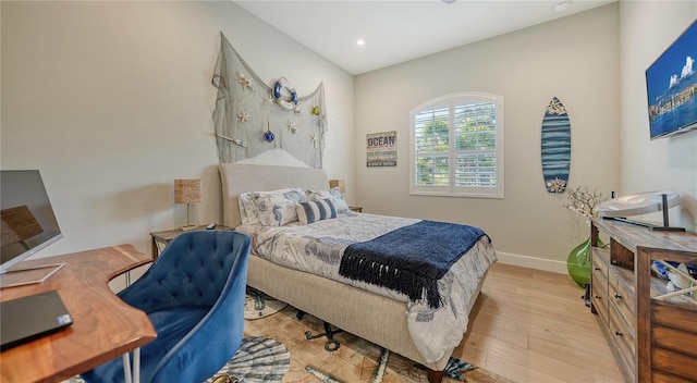 bedroom featuring light hardwood / wood-style flooring