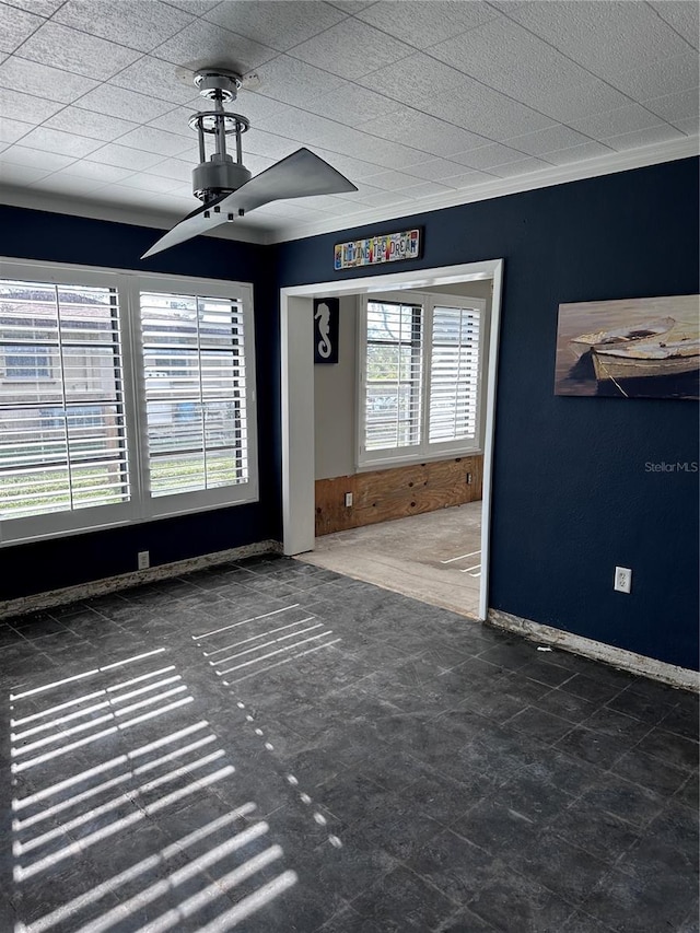 unfurnished room featuring ceiling fan