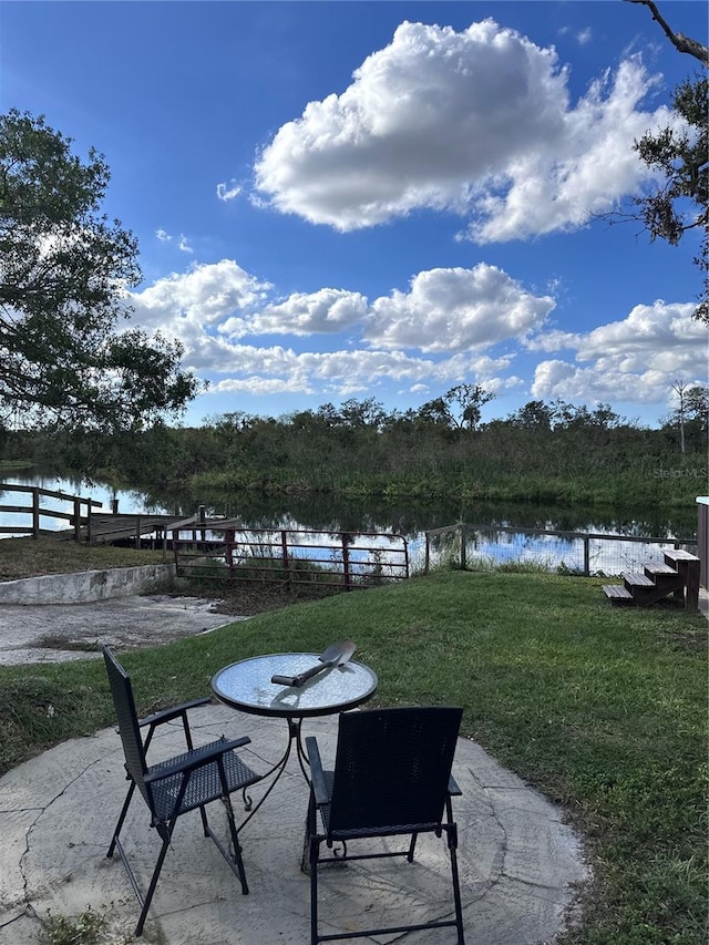 view of patio / terrace featuring a water view