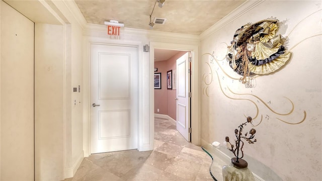 hallway featuring crown molding and elevator