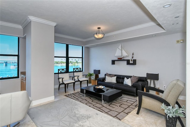 living room featuring a water view, light tile patterned floors, and ornamental molding