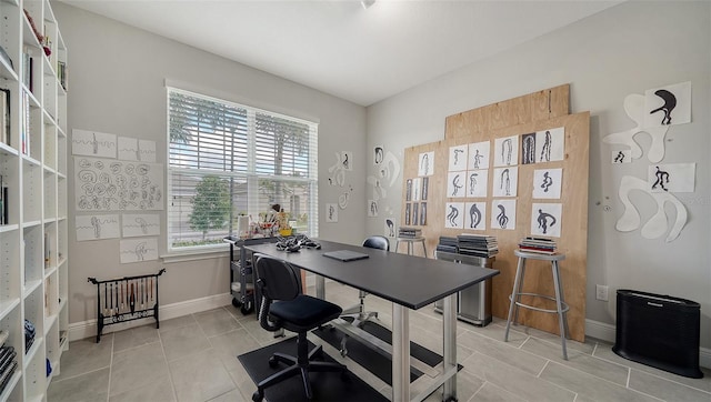 tiled office featuring a wealth of natural light