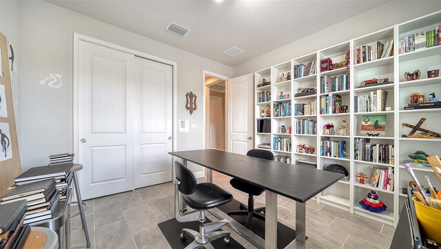 office featuring light tile patterned flooring