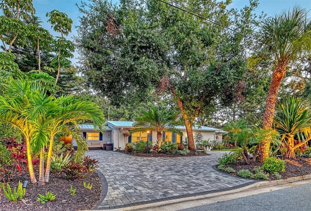 730 40th St, Sarasota, FL 34234 - view of front of property with decorative driveway and stucco siding