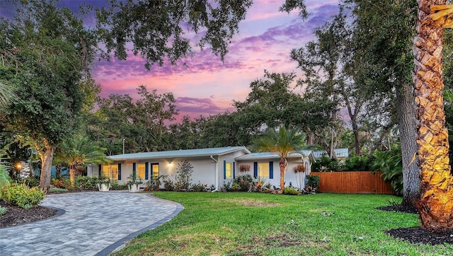 730 40th St, Sarasota, FL 34234 - single story home featuring decorative driveway and stucco siding