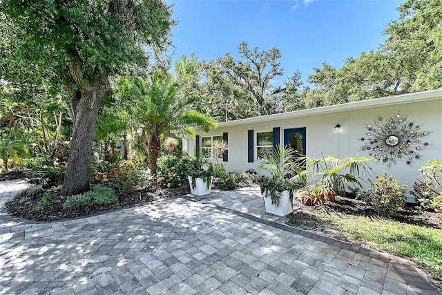 730 40th St, Sarasota, FL 34234 - view of front of house featuring a patio area and stucco siding