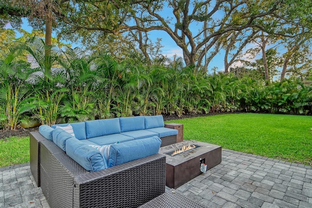 730 40th St, Sarasota, FL 34234 - view of patio featuring an outdoor living space with a fire pit