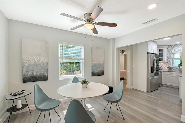 730 40th St, Sarasota, FL 34234 - dining space with light wood-type flooring, ceiling fan, and recessed lighting