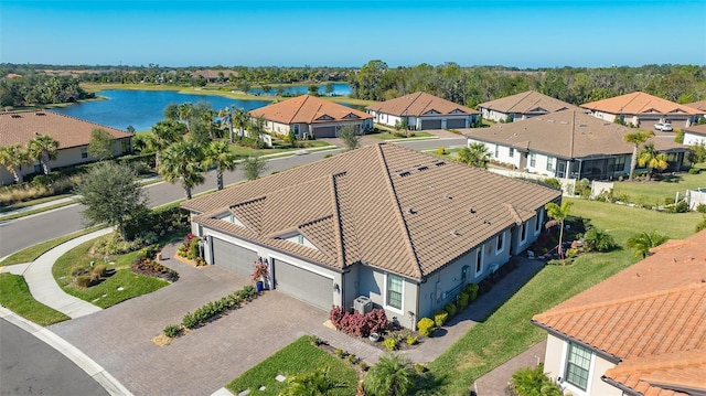 drone / aerial view with a water view