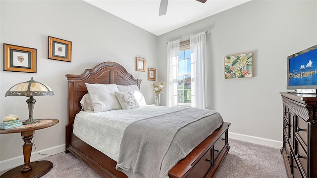 bedroom with ceiling fan and carpet