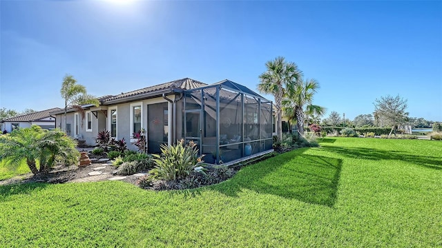 view of yard featuring a lanai