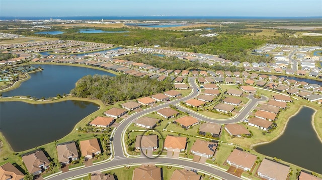 drone / aerial view featuring a water view