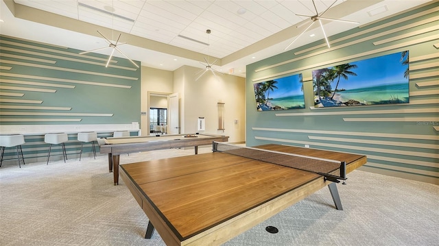 playroom featuring light carpet, a high ceiling, ceiling fan, and pool table