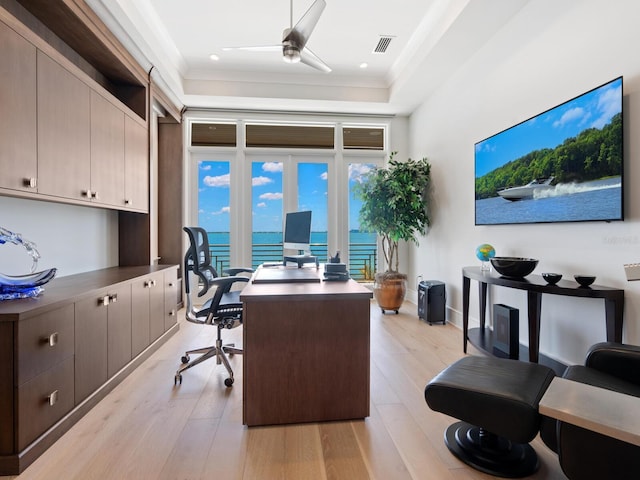 home office with ceiling fan, light wood-type flooring, and ornamental molding