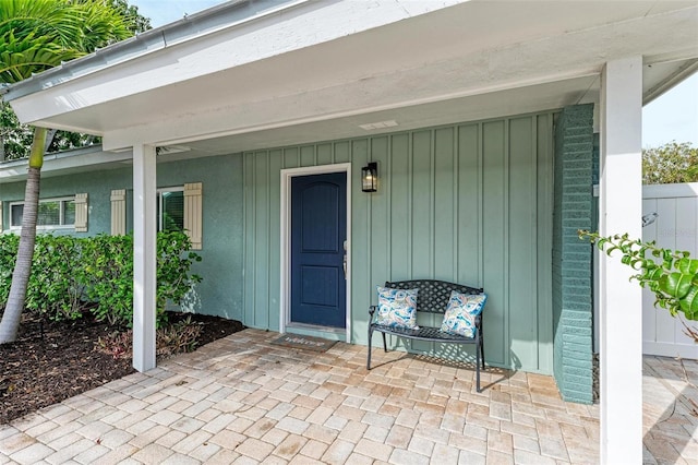 entrance to property with covered porch