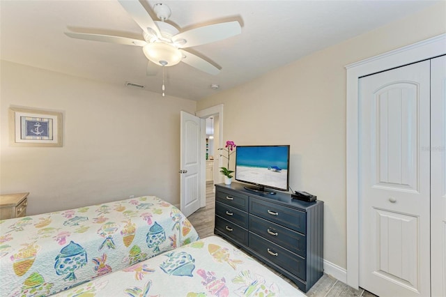 bedroom featuring a closet and ceiling fan