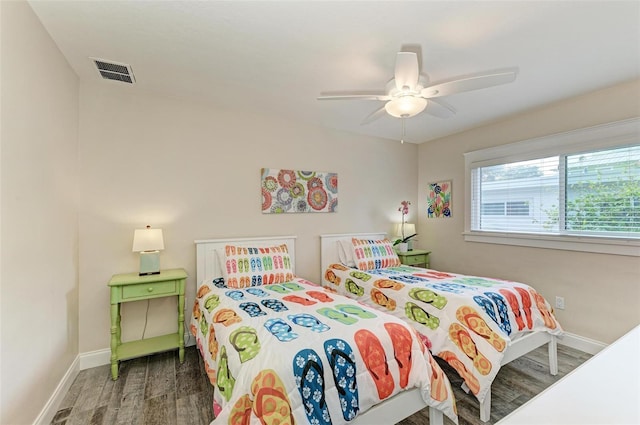 bedroom featuring ceiling fan and wood-type flooring