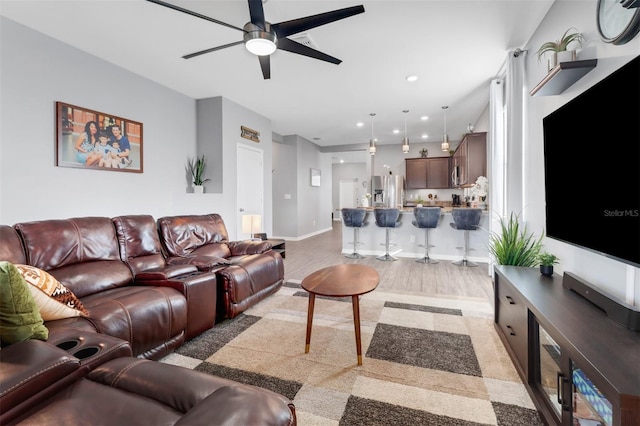 living room with ceiling fan