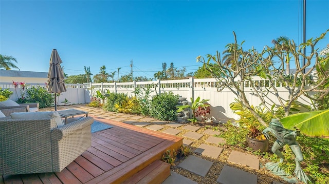 view of patio / terrace featuring a wooden deck