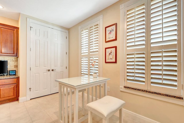 interior space featuring light tile patterned floors