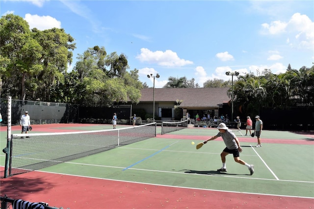 view of tennis court with basketball court