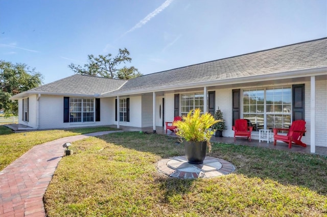 ranch-style home with a front yard