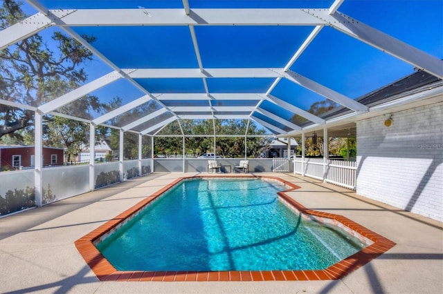 view of pool featuring a patio area and a lanai