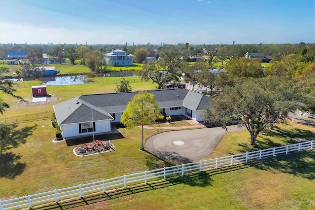 bird's eye view with a water view and a rural view