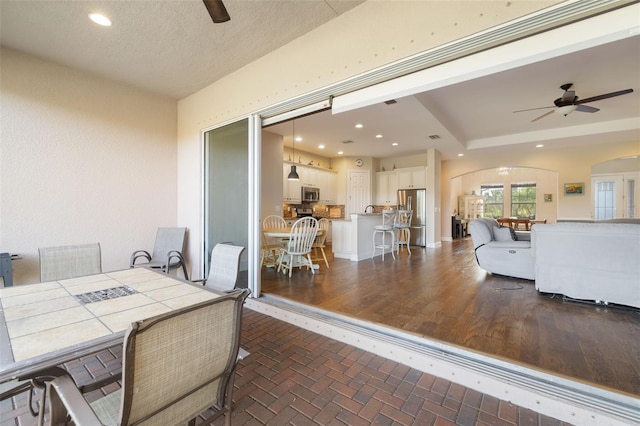 view of patio / terrace with ceiling fan