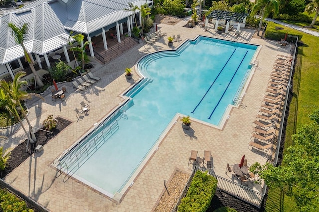 view of swimming pool featuring a patio area