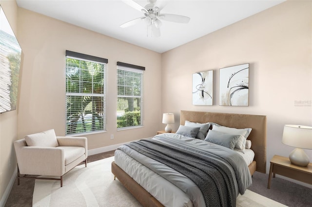 942 Preservation St, Bradenton, FL 34208 - bedroom with light colored carpet, baseboards, and a ceiling fan