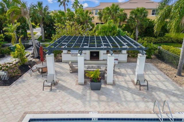942 Preservation St, Bradenton, FL 34208 - view of community featuring fence, an outdoor kitchen, a patio, and outdoor dining space